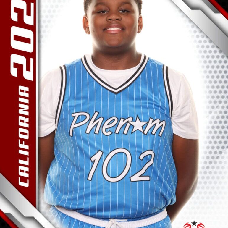 Young basketball player in blue jersey smiling for a sports card.