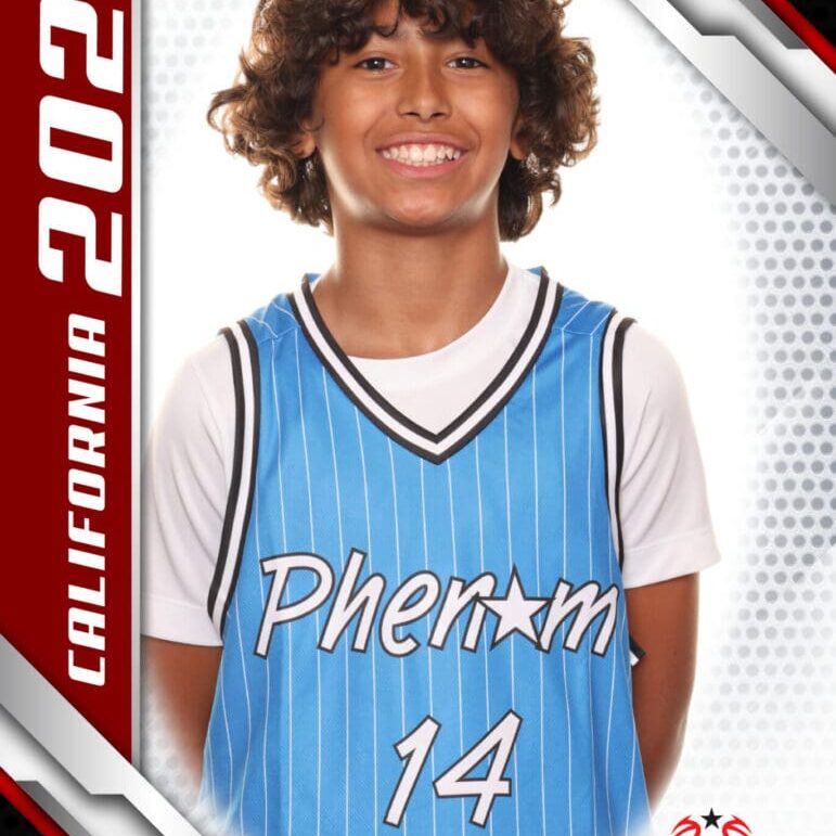 A smiling young basketball player in a light blue jersey numbered 14.