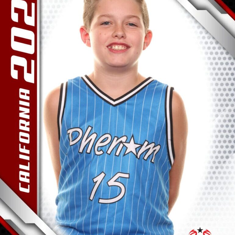 Young basketball player in a blue Phoenix jersey with number 15.