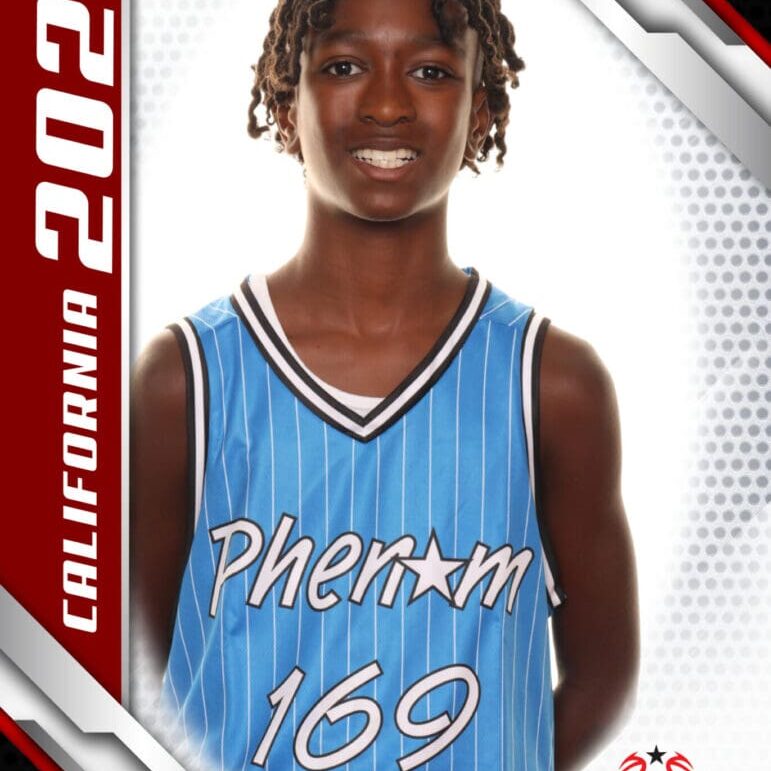 Young basketball player in blue jersey posing for a profile photo.