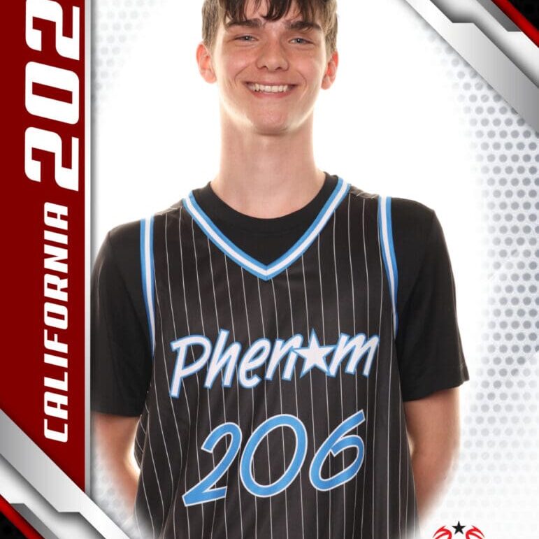 Young basketball player wearing a Phenom 206 jersey.