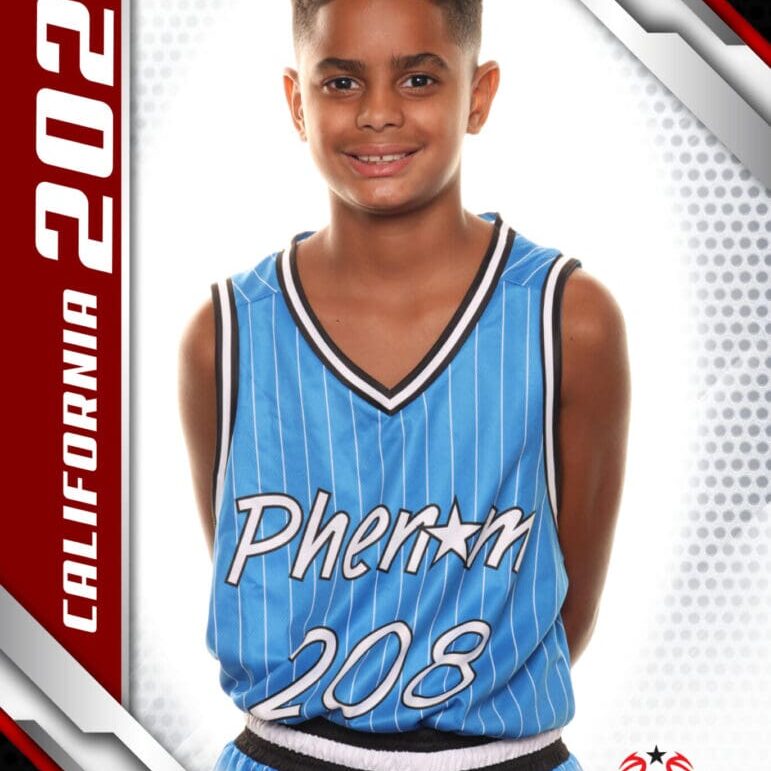 Young basketball player in a blue jersey posing for a sports photo.