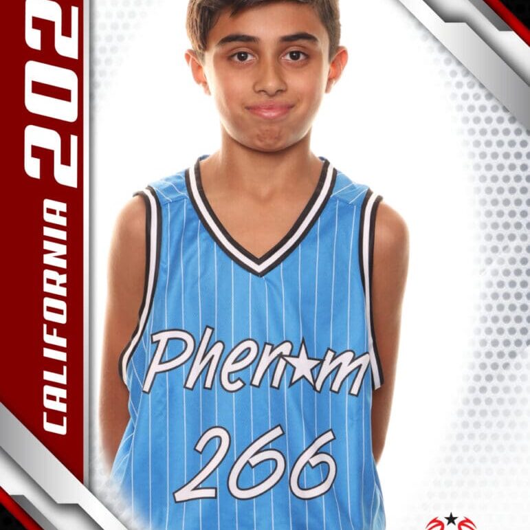 Young basketball player in a blue jersey with number 266.