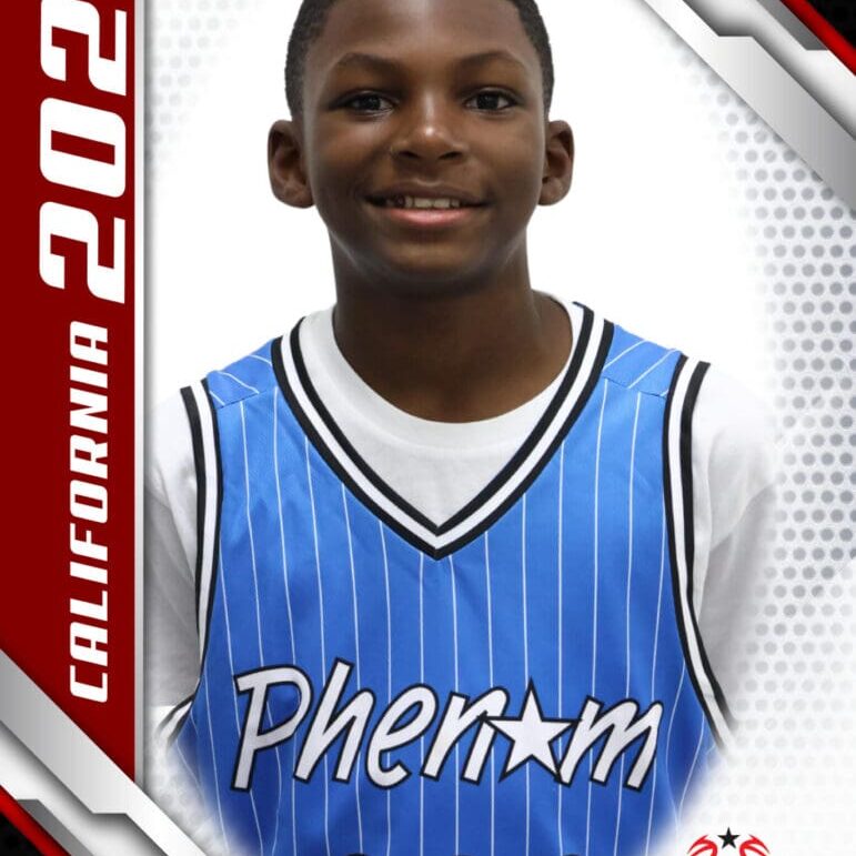 Young basketball player in blue Pherom jersey posing for a photo.