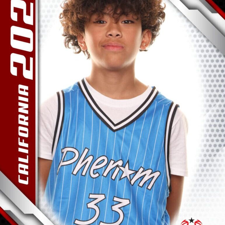 Here's an alt text option for the image: Boy, basketball jersey, Phenom Camp, 2024.