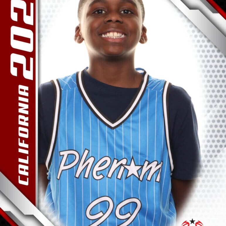 Smiling basketball player wearing a blue Phenom jersey with number 99.